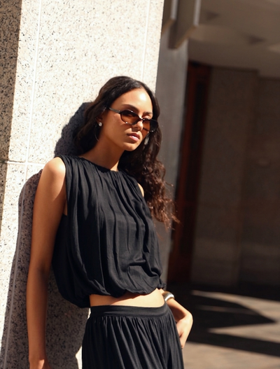 Koa Puff Ball Hem Top In Black