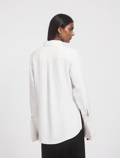 Back view of Signature Luxe Shirt in White on model