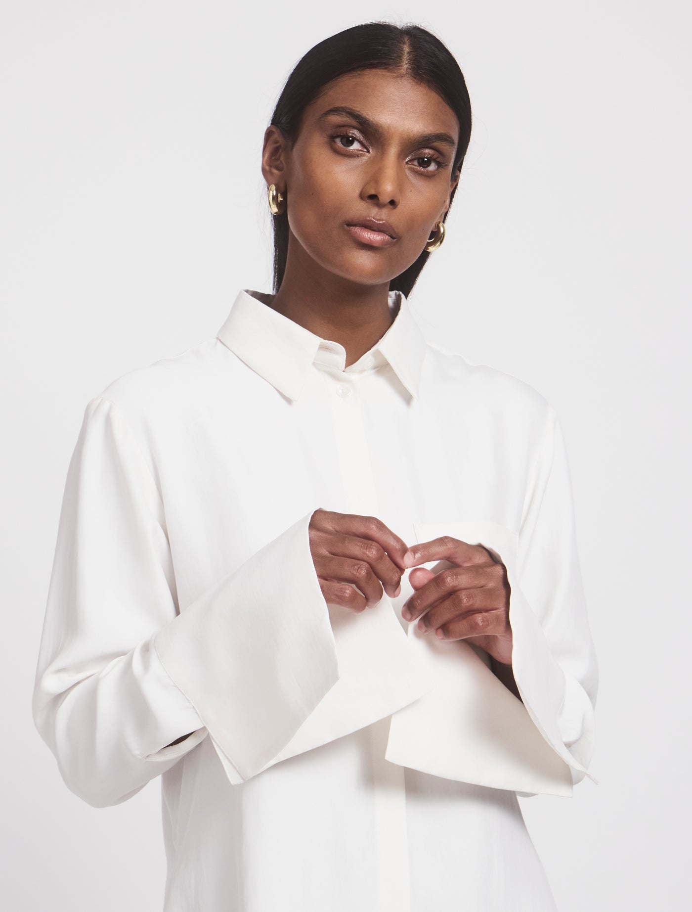 Model wearing Signature Luxe Shirt in White, collar focus