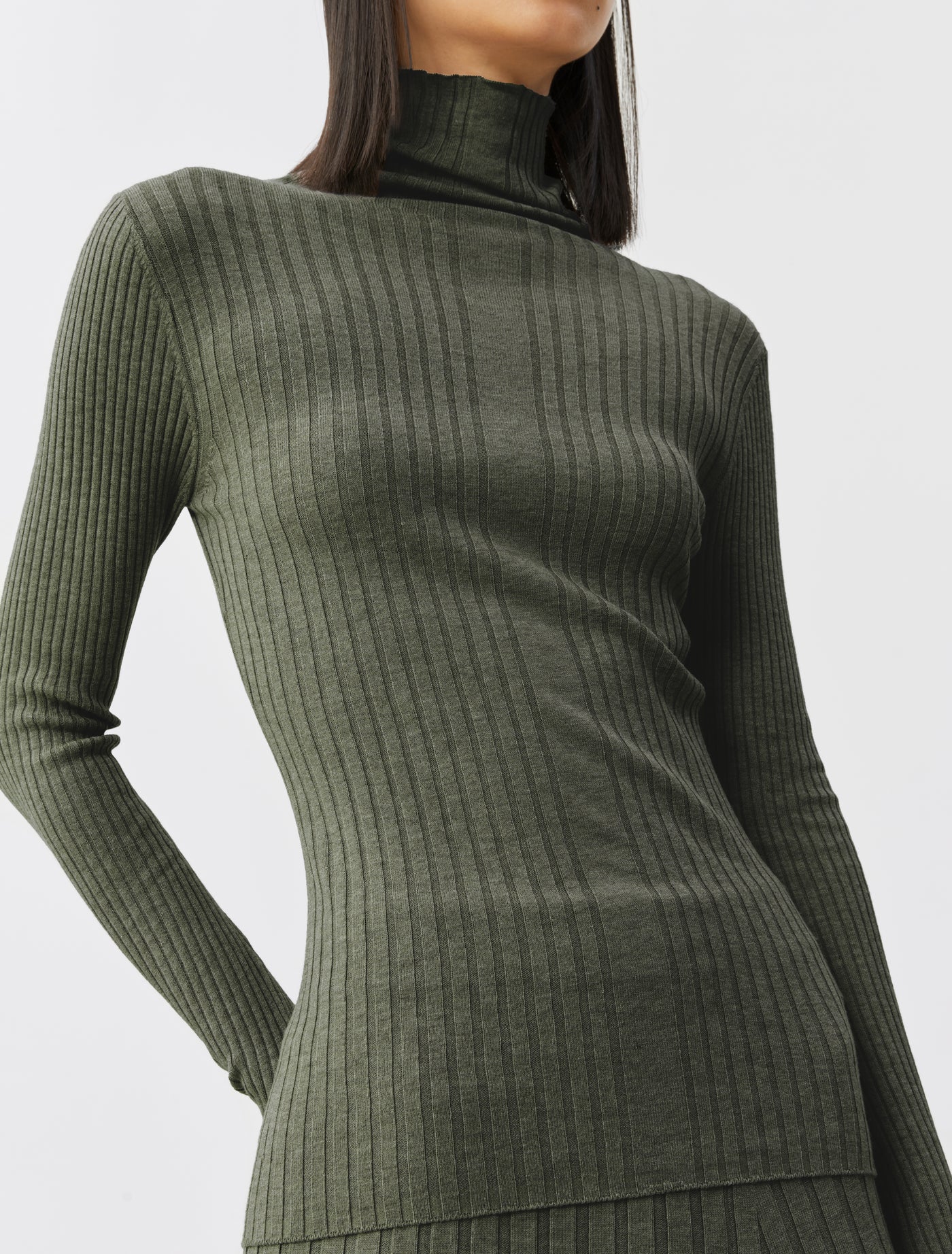 Selene Rib Funnel Neck in green marl, front view