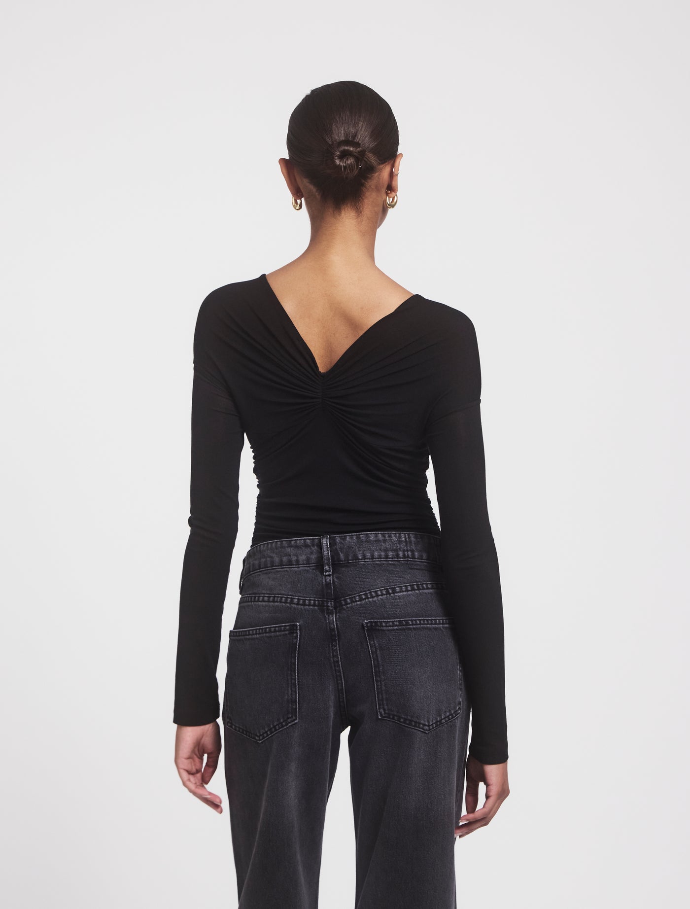 VESTA TOP in Black, back view on model