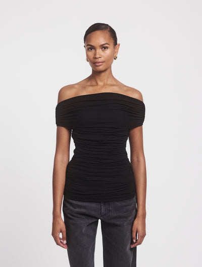 Front view of Noho Top in Black, elegant off-shoulder style