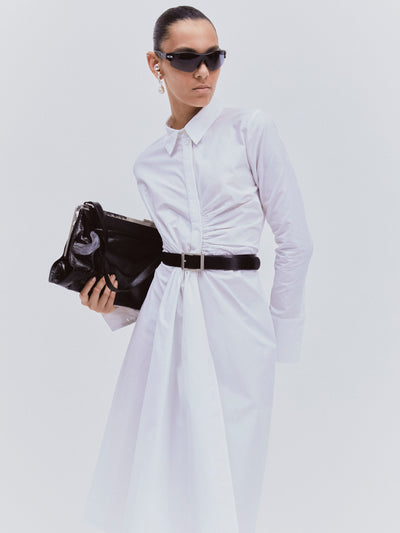 Model wearing Ophelia Shirtdress in white with sunglasses