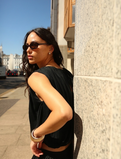 Koa Puff Ball Hem Top In Black